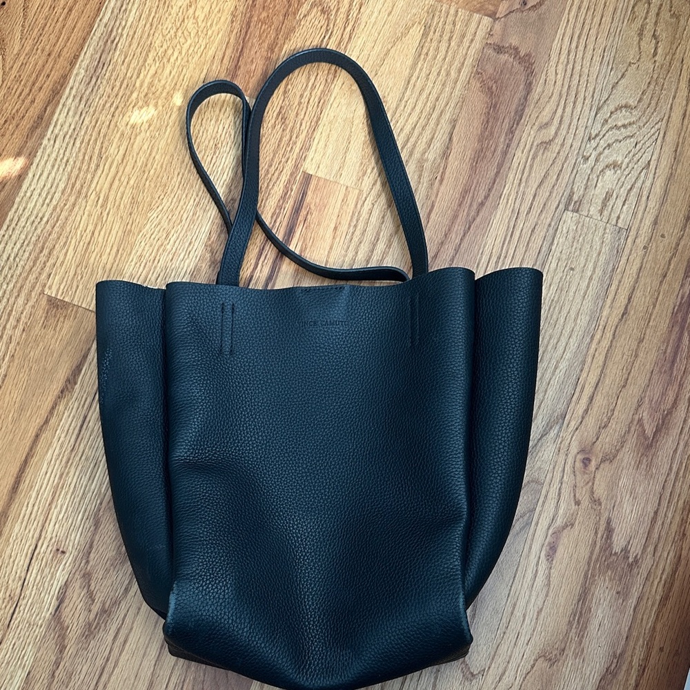 Vince Camuto Black Leather Tote Bag
Multi compartments and zip top EXCELLENT